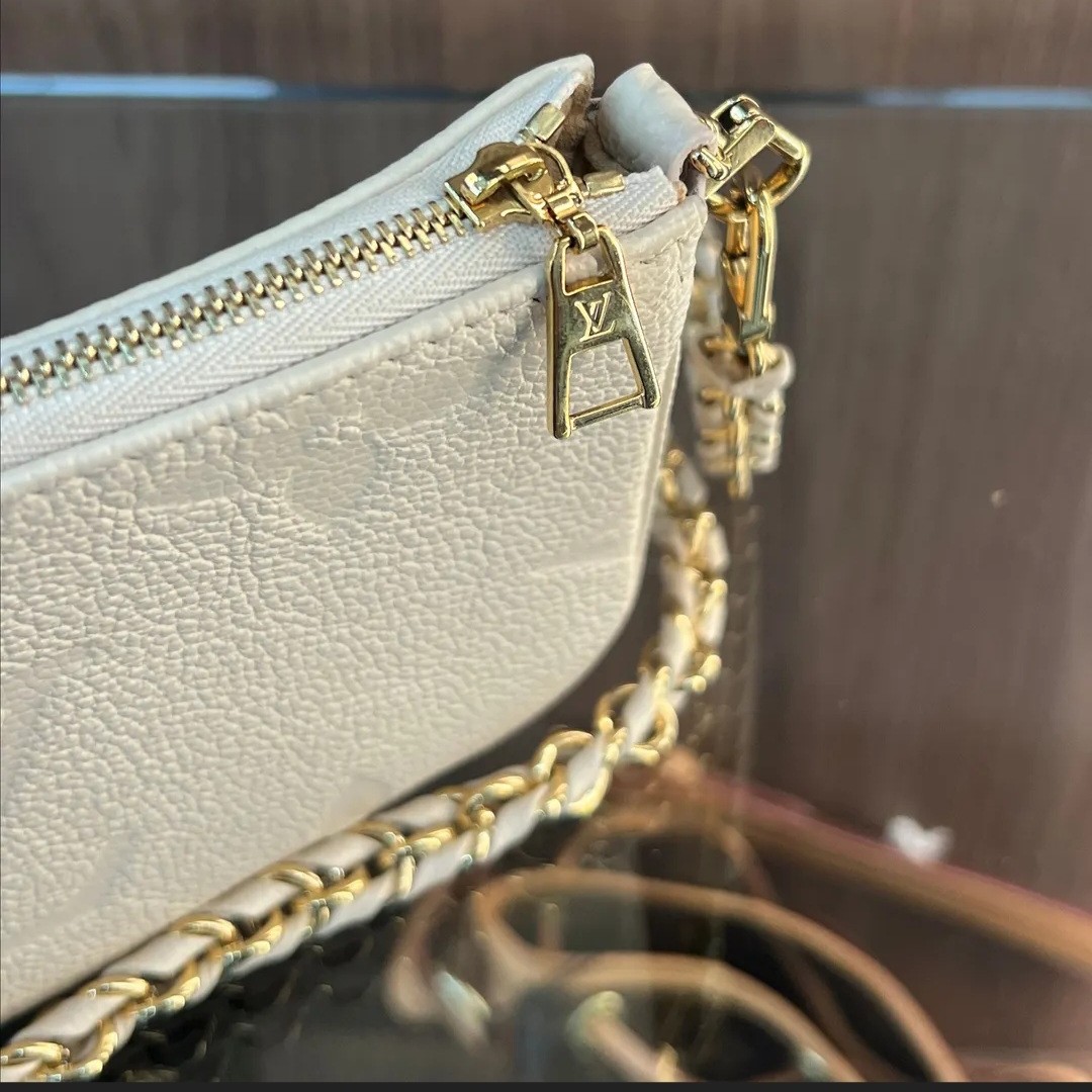 Louis Vuitton Monogram Empreinte Mini Pochette Cream Ivory White - Image 2