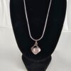 Yves Saint Laurent (YSL) geometric crystal solitaire pendant necklace, a rare and highly collectible piece of French haute couture history.