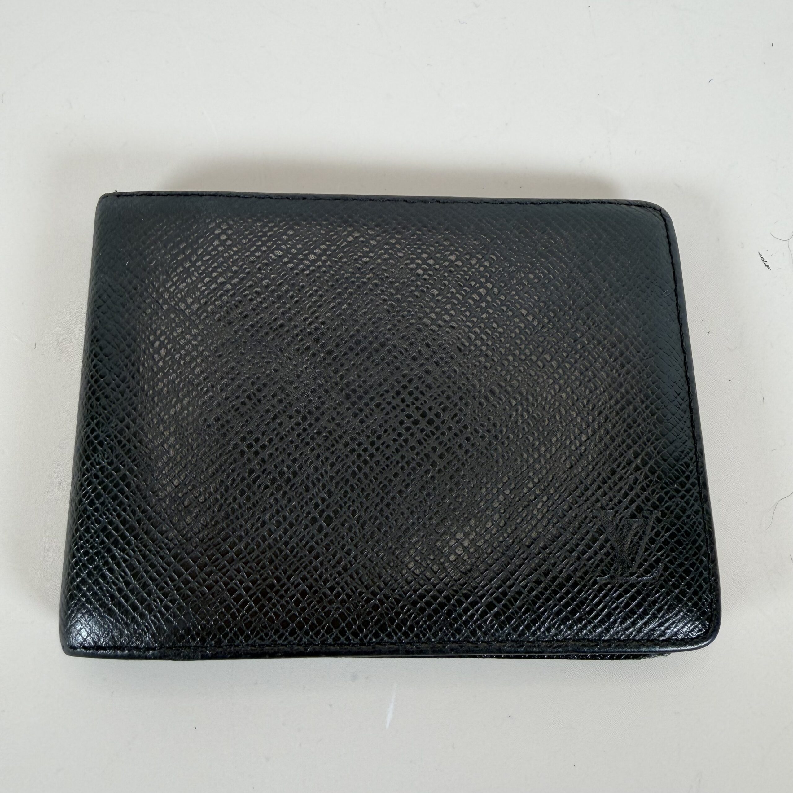 Louis Vuitton Multiple Wallet in Black Taiga Leather