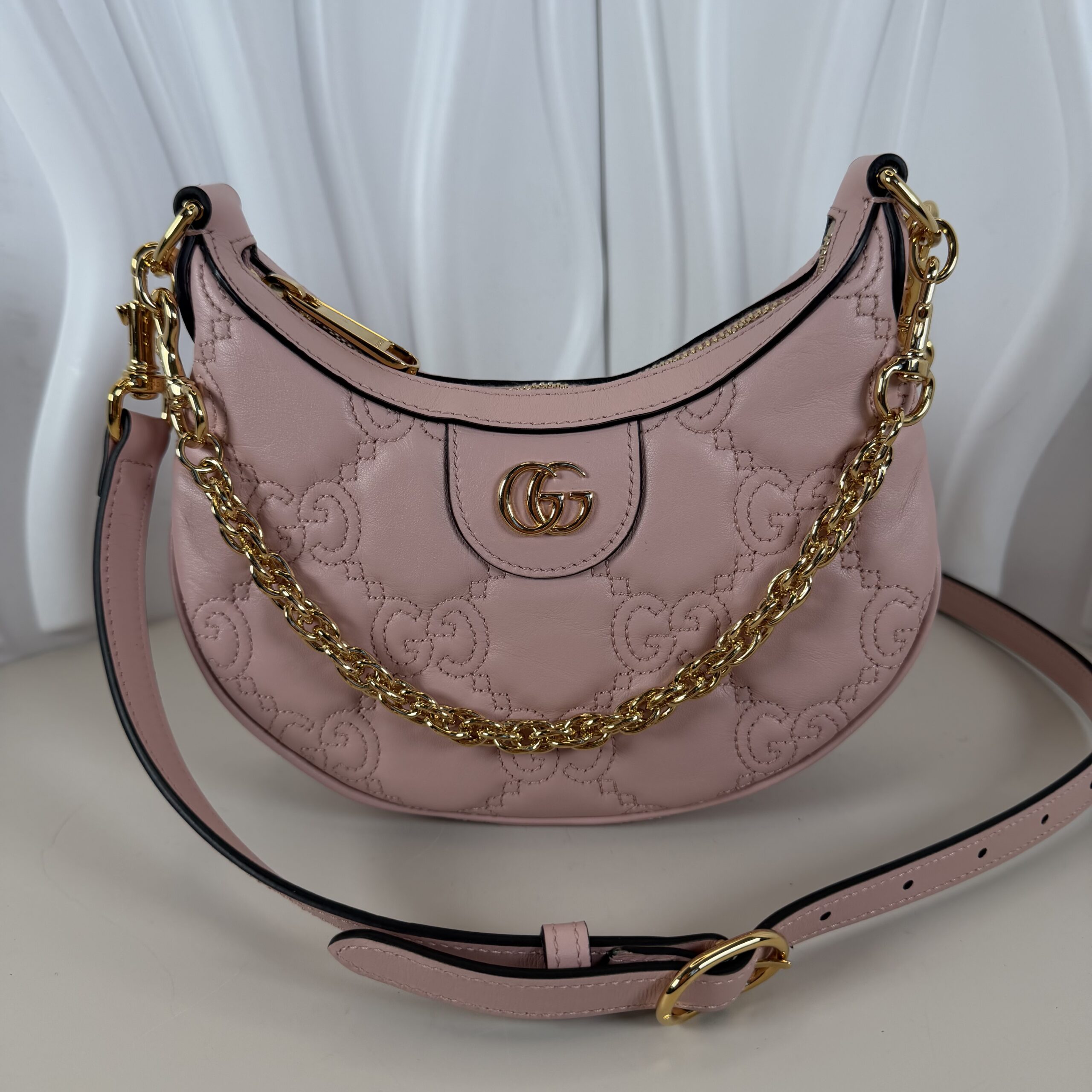 Gucci mini GG Matelassé shoulder bag in a light pink hue