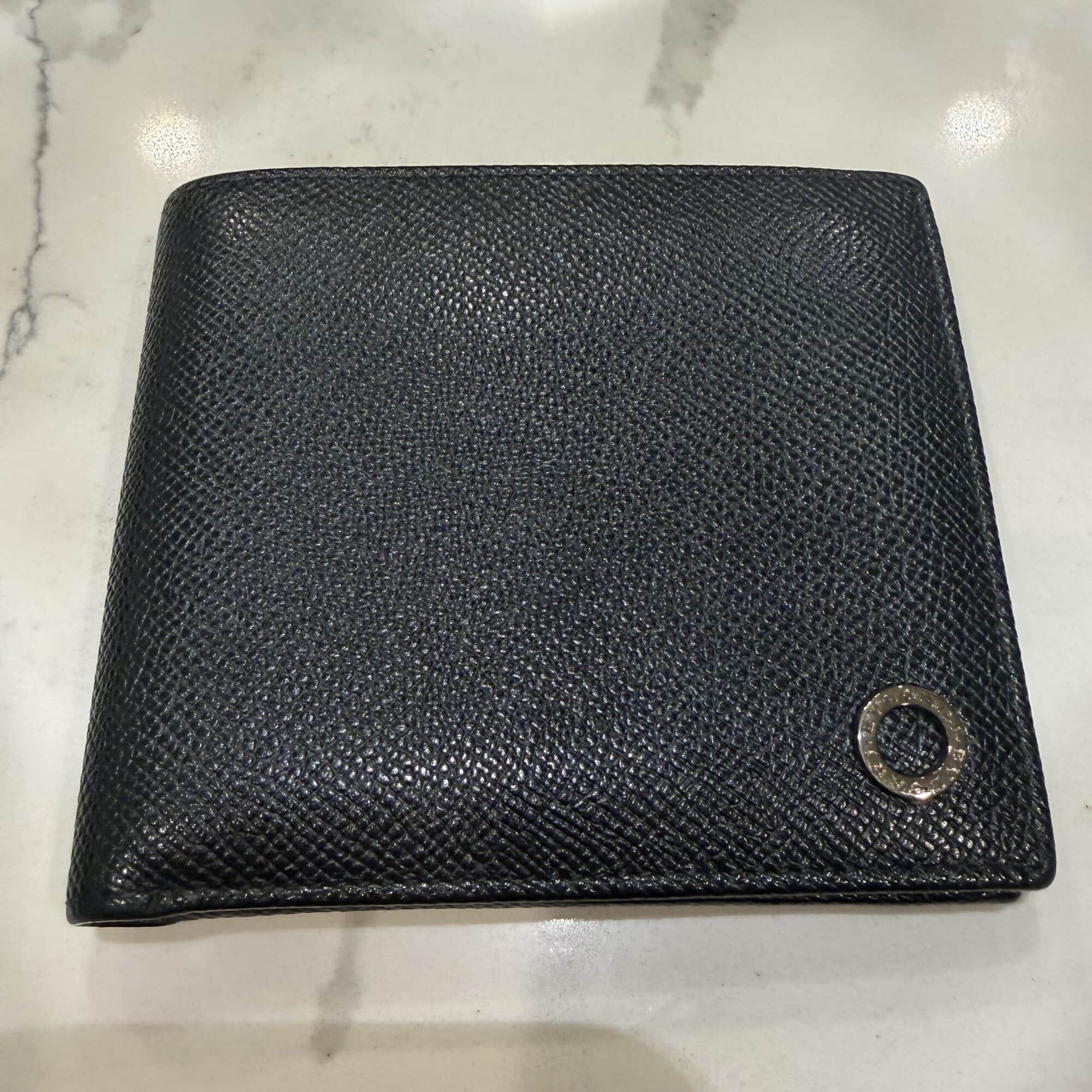 Bvlgari Bvlgari Man Black Grained Leather Bifold Wallet with Iconic Silver-Tone Ring Logo