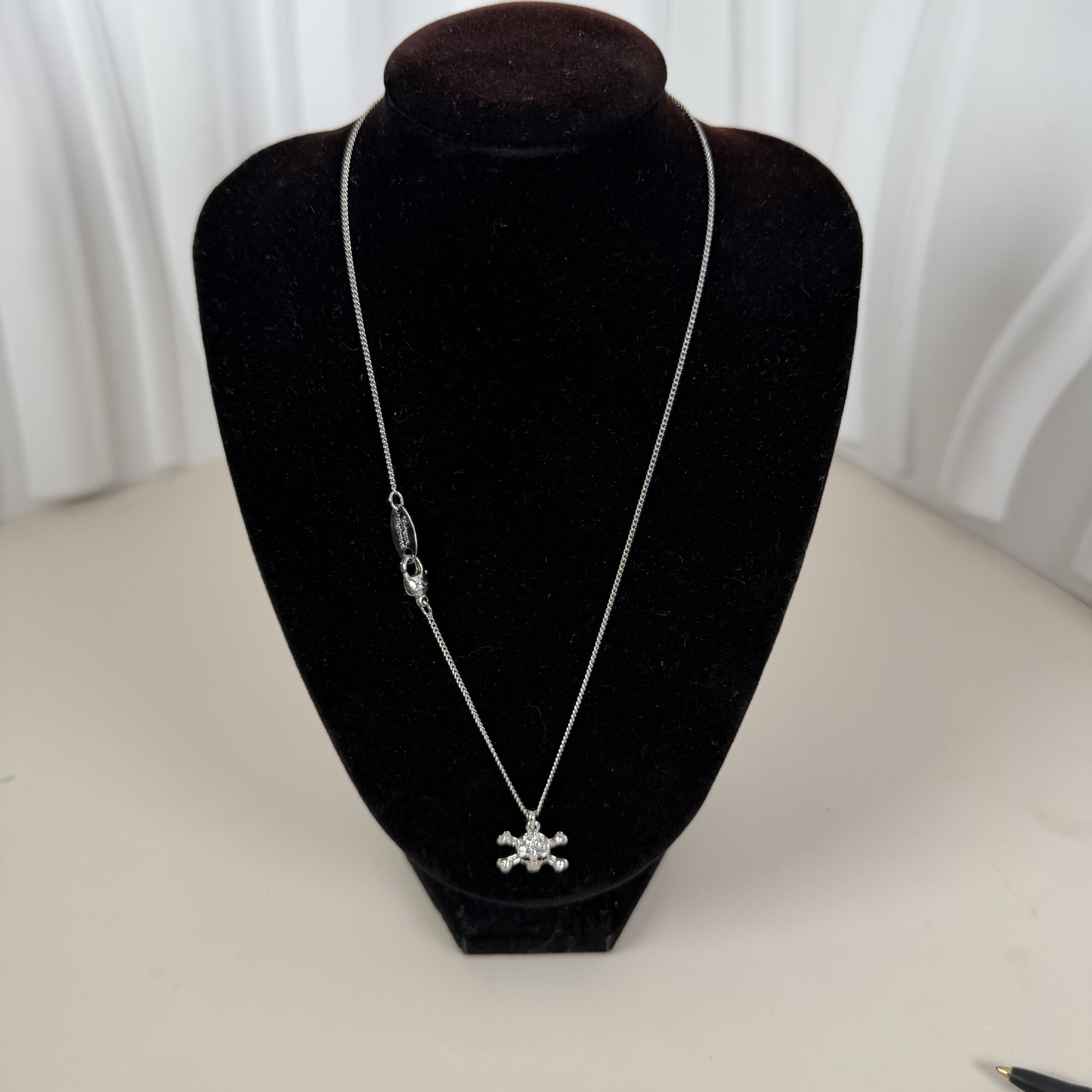 Vivienne Westwood-inspired Jolly Roger skull and crossbones pendant necklace
