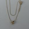 Pre-Owned Authentic Yves Saint Laurent (YSL) Gold-Tone Pavé Crystal Love Knot Pendant Necklace