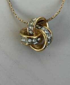 Alternative view of Yves Saint Laurent (YSL) Gold-Tone Pavé Crystal Love Knot Pendant Necklace