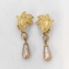 Yves Saint Laurent (YSL) Leaf-Motif Baroque Pearl Drop Clip-On Earrings.
