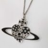 Vivienne Westwood 2D Flat Heart Star Orb Pendant Necklace in silver-tone metal and black enamel