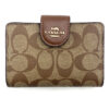 Coach Medium Corner Zip Wallet in Signature Canvas Khaki Saddle Brown C0082