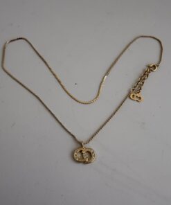 Pre-Owned Authentic Christian Dior Interlocking CD Logo Rhinestone Pendant Necklace – Gold Tone