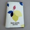 Kate Spade New York Cameron Lemon Zest Passport Holder Wallet