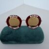 Gucci Maison de l'Amour Striped Round Sunglasses (GG0113S)
