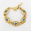 Yves Saint Laurent Gold-Tone Oval Link Blue Accent Station Bracelet
