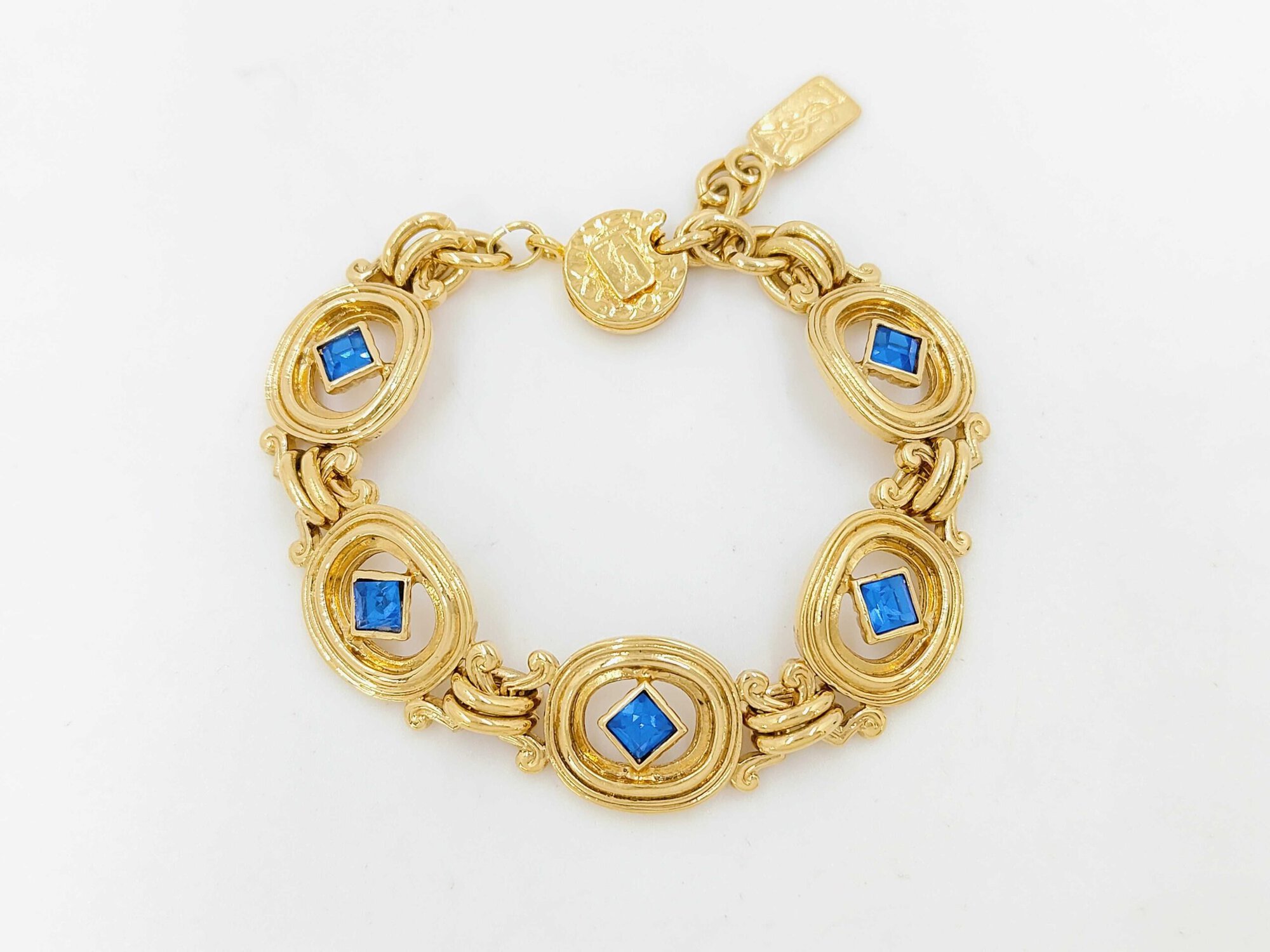 Yves Saint Laurent Gold-Tone Oval Link Blue Accent Station Bracelet