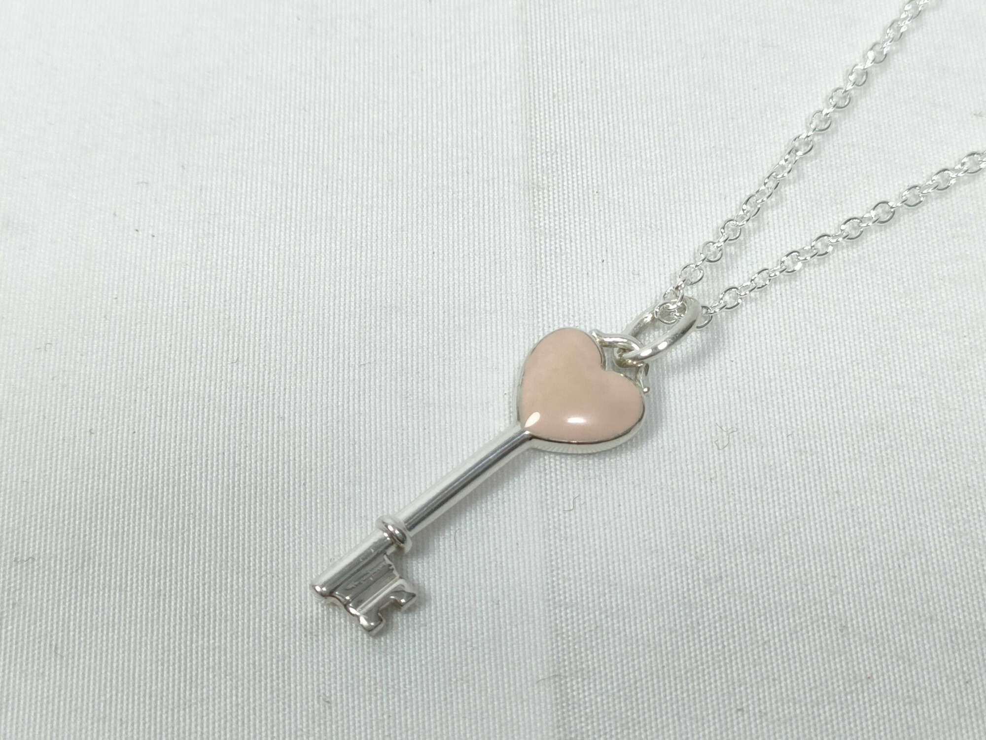 Tiffany & Co. Sterling Silver Pink Enamel Heart Key Pendant Necklace