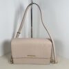 Furla Metropolis mini, grey Saffiano leather bag, Furla crossbody chain bag, designer mini shoulder purse, gold push lock clutch, pre-owned Furla luxury, grey Italian leather handbag, compact designer evening bag, Furla monogram wallet bag, luxury gold chain purse