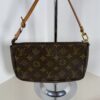 Louis Vuitton Pochette Accessoires in classic Monogram coated canvas