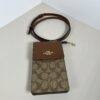 Coach North/South Phone Crossbody in Signature Canvas