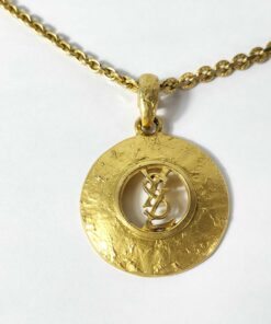 Vintage Yves Saint Laurent Gold Tone Hammered Round Cutout YSL Logo Pendant Necklace