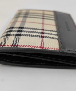Folded spine and edge profile of Burberry card case.
