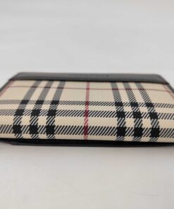 Bottom edge profile of Burberry card case showing folded Nova Check canvas.