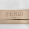 Front view of Fendi Roma powder pink leather continental flap wallet showing embossed logo.