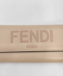 Front view of Fendi Roma powder pink leather continental flap wallet showing embossed logo.