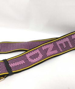 Close-up of Fendi woven jacquard logo webbing showing purple ground, pink lettering, and yellow trim.