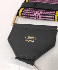 Detail view of black leather end mount displaying gold foil FENDI ROMA signature stamp.
