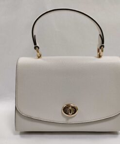 Front view of Coach Chalk White Crossgrain Leather Tilly satchel with gold-tone turnlock and top handle