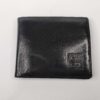 Givenchy Monsieur black leather bifold wallet with debossed 4G emblem on the front corner