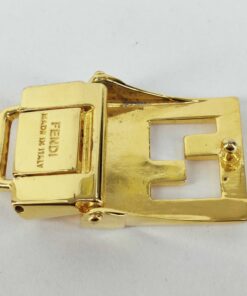 Fendi gold-tone belt buckle reverse view showing clamp plate and stud peg