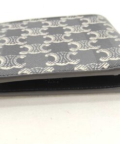 Top edge view of Celine Triomphe bifold wallet showing currency compartment opening.