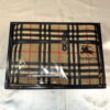 Burberrys Nova Check bath towel folded inside navy presentation box with ribbon