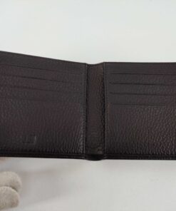 Open interior of Dunhill wallet showing eight card slots and debossed brand logo.