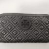 Front view of black quilted leather Tory Burch Fleming continental wallet with Double T logo medallion.