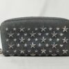 Front view of Jimmy Choo charcoal glitter leather Filipa wallet with silver star studs.