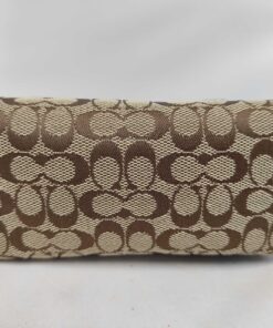 Bottom panel of Coach signature canvas cosmetic pouch