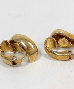 Back view of Christian Dior gold-tone clip-on earrings showing closed paddle clips