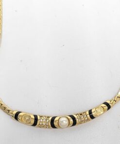 Christian Dior gold-tone collar necklace with curved accent station bar.
