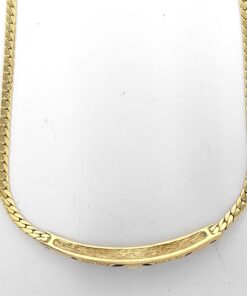 Reverse side of curved front station bar on gold-tone necklace.