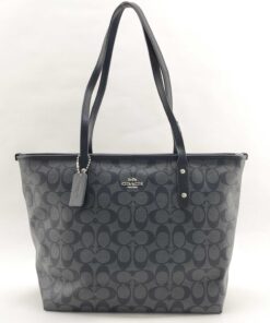 Coach City Zip Tote in black and charcoal signature coated canvas, front view.