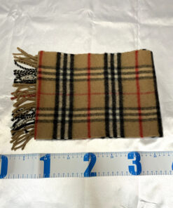 Burberrys camel check wool scarf displayed with a tape measure showing 12-inch width