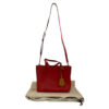 Tory Burch red pebbled leather Perry small tote bag on cream dust bag with attached strap and charm