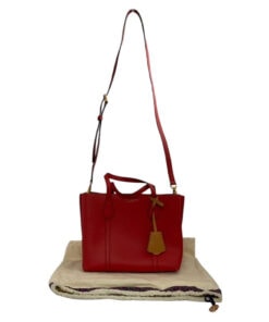 Tory Burch red pebbled leather Perry small tote bag on cream dust bag with attached strap and charm