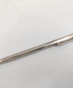 Tiffany & Co. T-Clip sterling silver slim twist ballpoint pen shown in full angle view on white background.