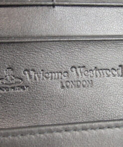 Close-up of debossed Vivienne Westwood London Made in Italy leather stamp