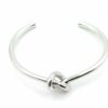 Celine Knot Extra-Thin silver-tone open cuff bracelet viewed from the front