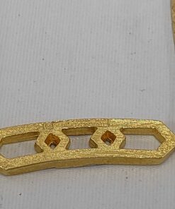 Reverse of Givenchy gold-tone hexagonal link necklace station showing brushed texture and hallmark.