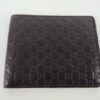 Folded Gucci Microguccissima black leather bifold wallet front exterior view