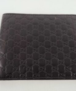 Folded Gucci Microguccissima black leather bifold wallet front exterior view