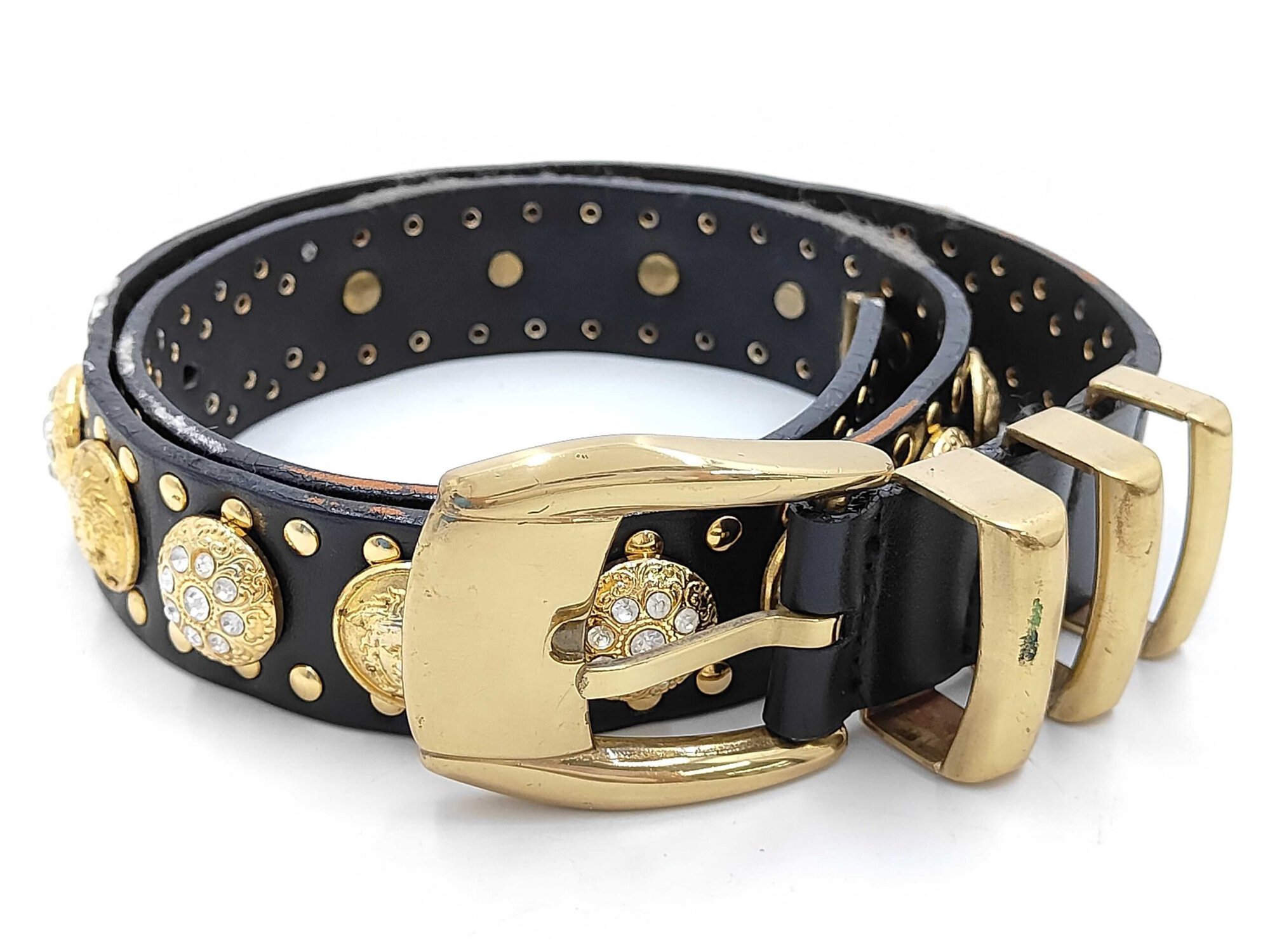 Gianni Versace Medusa crystal studded leather belt coiled showing buckle and medallions